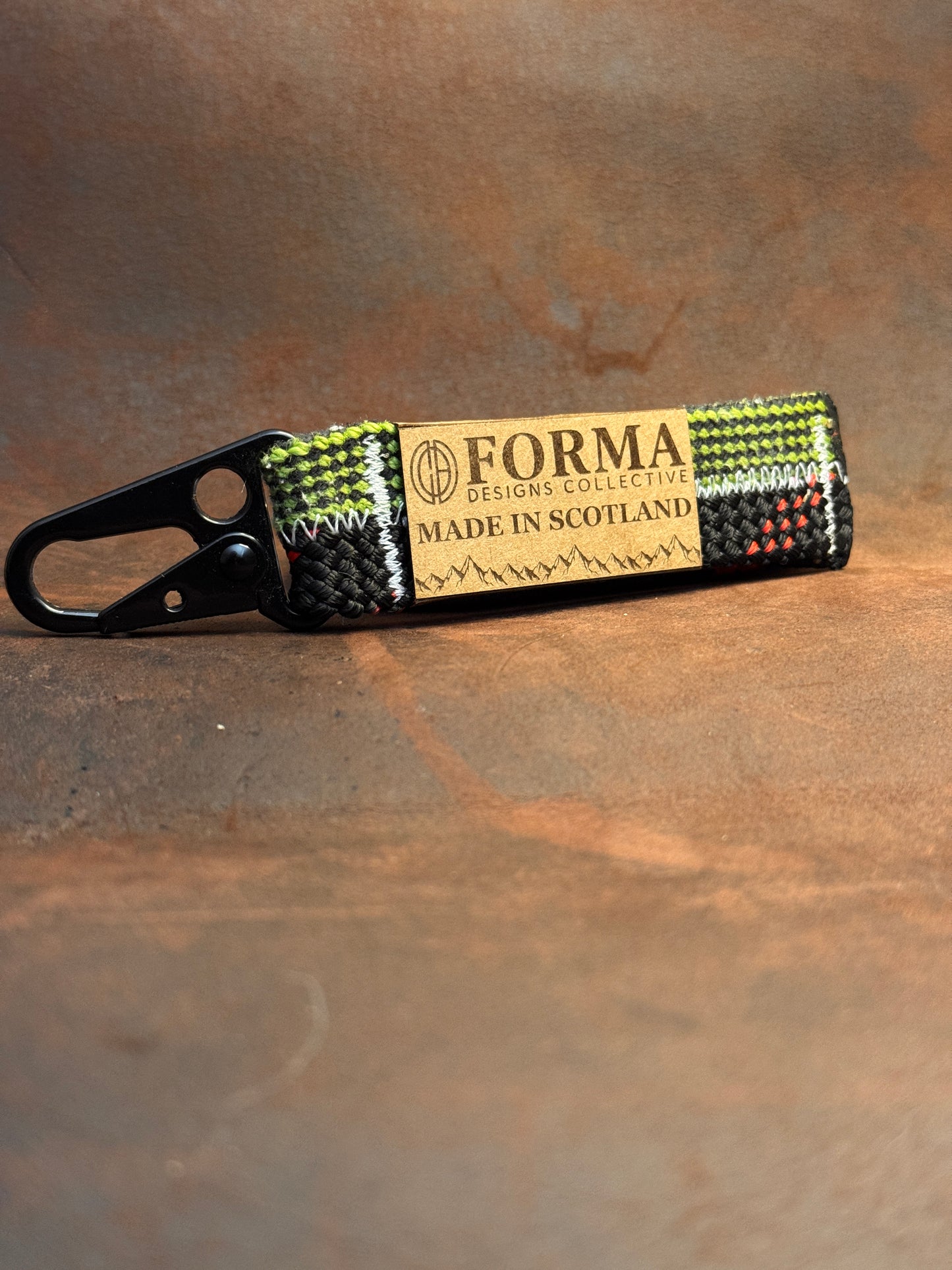 Green and black climbing rope carabiner keychain
