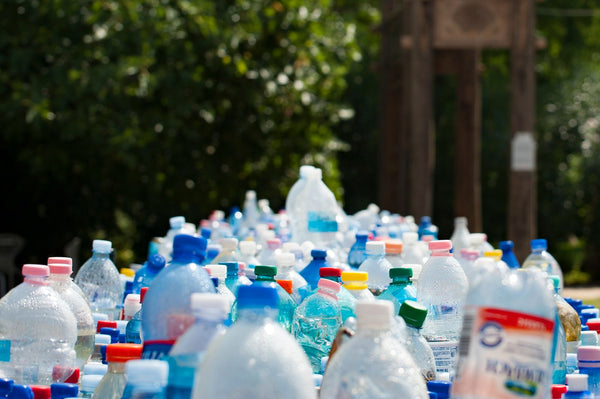 A pile of assorted empty plastic bottles