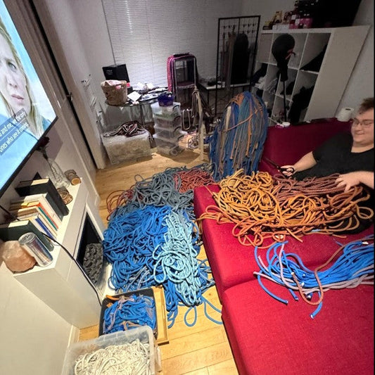 Retired climbing rope being measured and prepared for product development in the FORMA workshop.