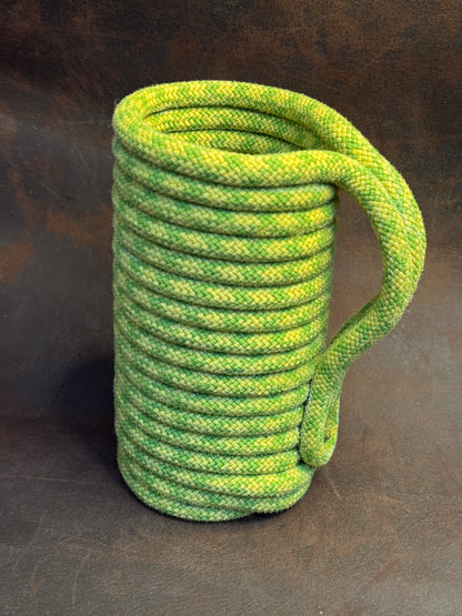 Green recycled climbing rope cup cosy / koozie holding a drink